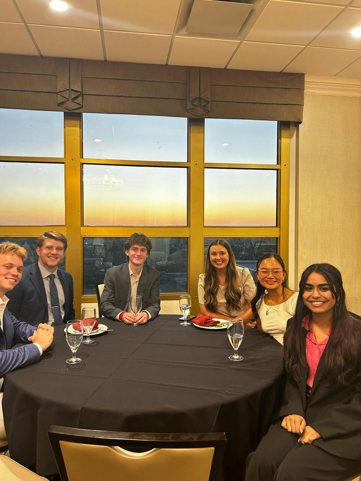 Members seated together at the health professions dinner
