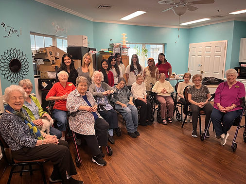 AED members volunteering at a local senior living community