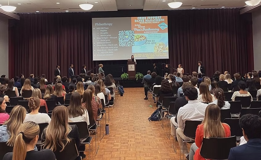 AED members filling the auditorium during a chapter meeting