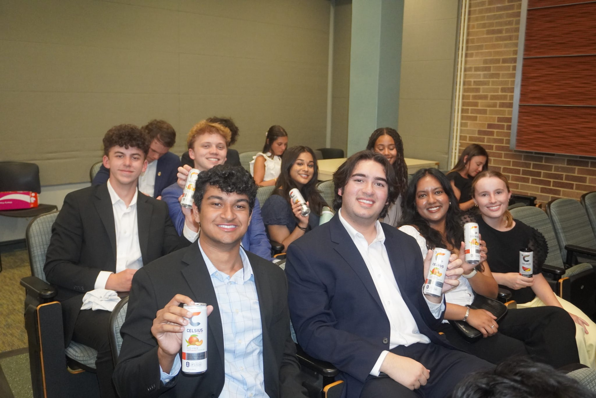 AED members seated together at a chapter meeting